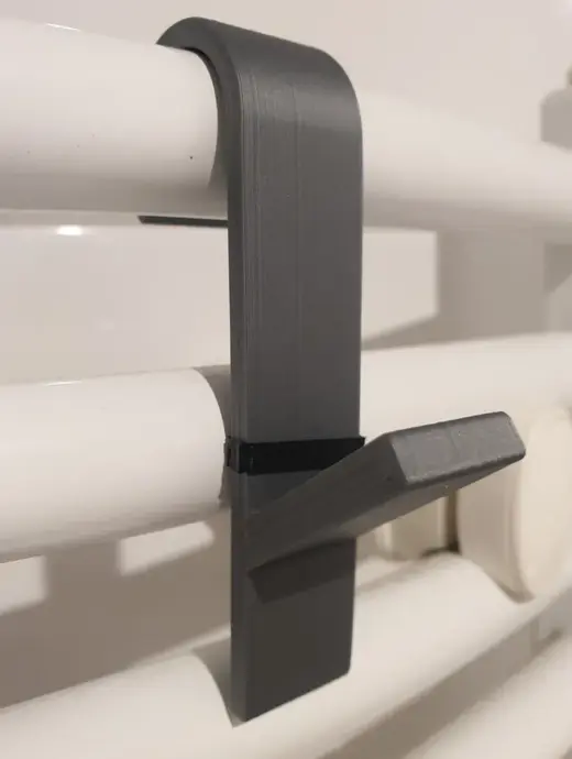 Soundproofing cover for a radiator hanger