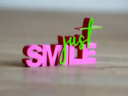 Schriftzug just smile
