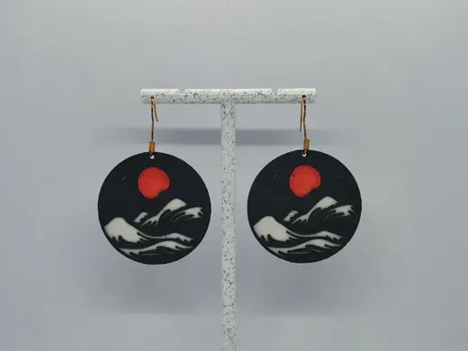 Aretes Ola y Sol