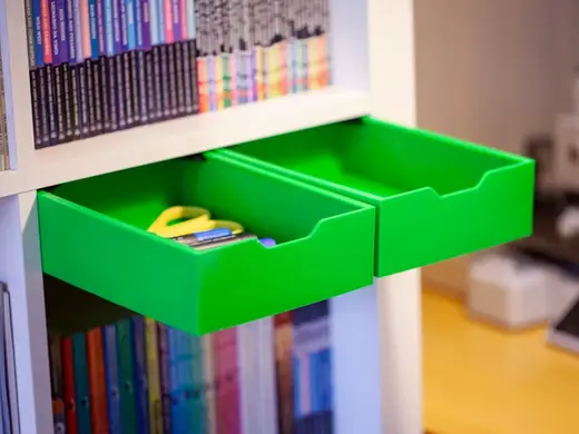 The drawer under the bookshelf