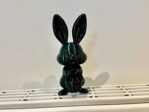 Easter Bunny Holding Basket with Eggs