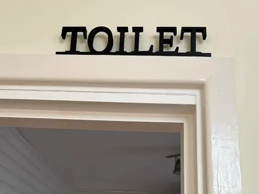 Over Door Frame TOILET Sign