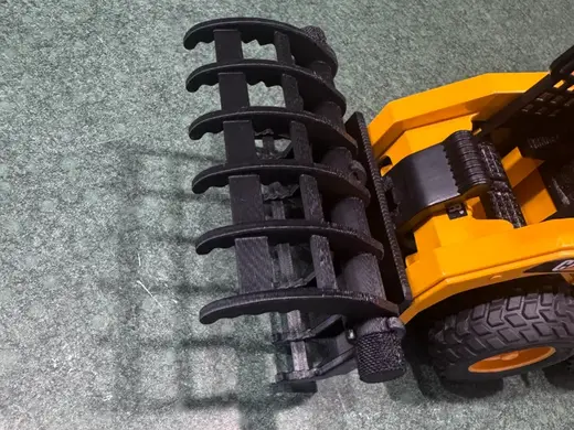 Bruder skid loader grapple